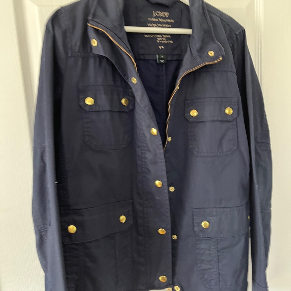 J. Crew women medium jacket in navy blue with gold buttons.